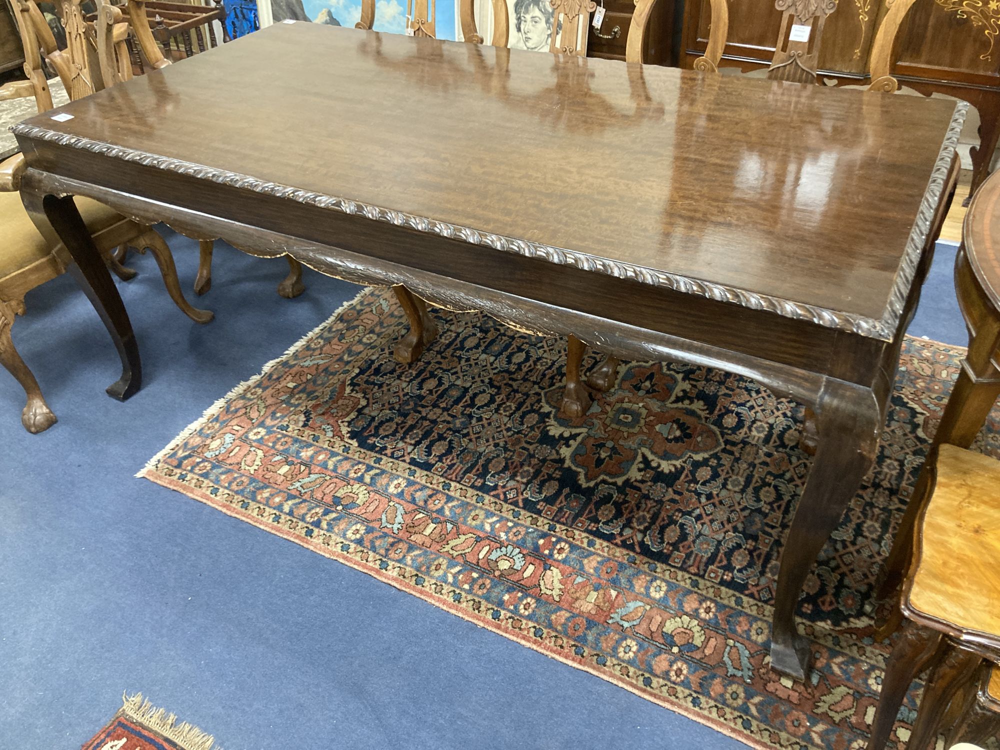 A George III style mahogany rectangular topped dining table, length 188cm, depth 94cm, height 78cm